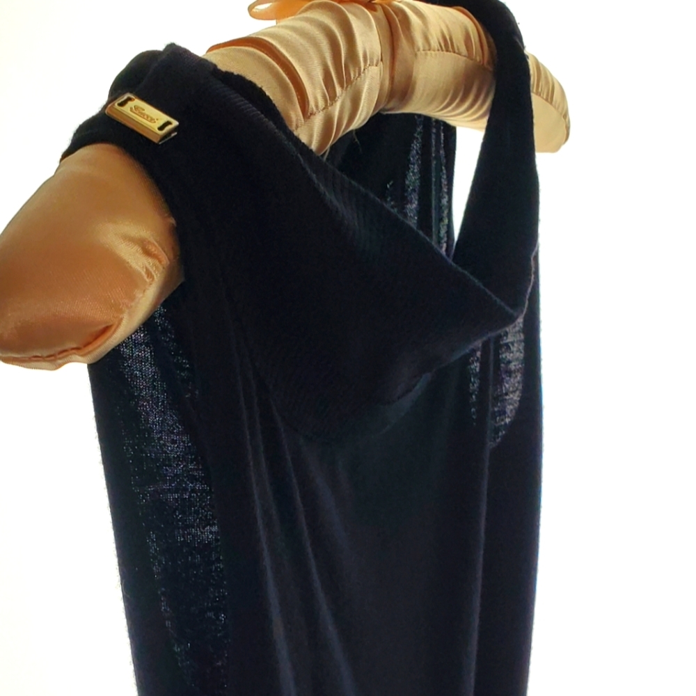 GUCCI black wool knit sleveless shirt with metallic Gucci emblems on shoulder